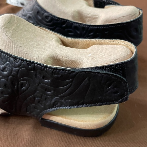 Leather sandals with Velcro closure on the outer sides. Approx 1 inch heel. - Picture 8 of 10